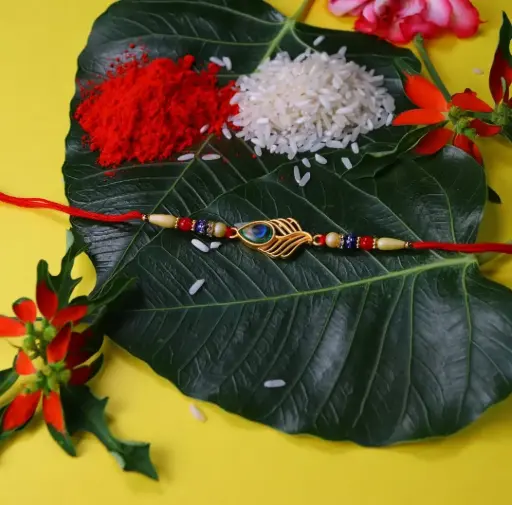 Peacock Feather Golden Rakhi